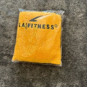 LA fitness yellow towel